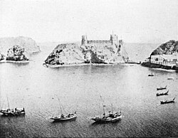 Puerto de Mascate alrededor de 1903 con el Fuerte Al Jalali al fondo