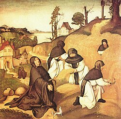 Monjes cistercienses trabajando en el campo.