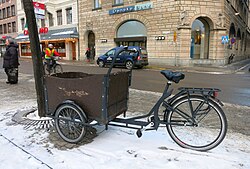 Triciclo de carga utilizado para el transporte de mercancías a pequeña escala