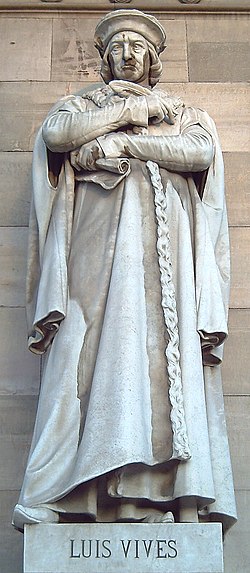 Estatua de Luis Vives en el pórtico de la Biblioteca Nacional de España.