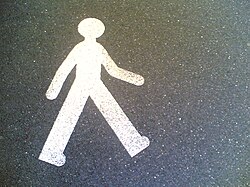 Signo urbano de un peatón en Suiza
