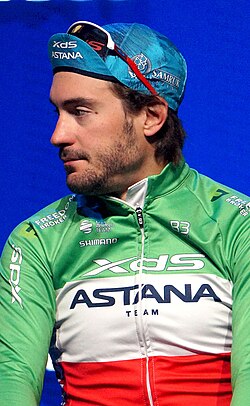 Fotografía de perfil de Alberto Bettiol en competiciones de ciclismo profesional