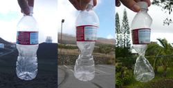 Botella de plástico sellada a gran altitud y deformada al descender hacia el nivel del mar